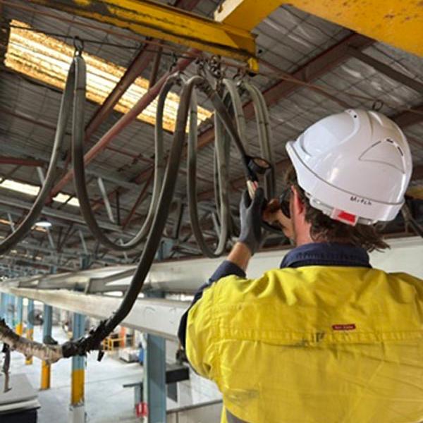 Inspection of industrial crane for manufacturing business in Sydney